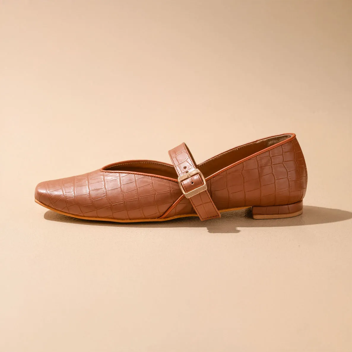 Tan textured Mary Jane Flats